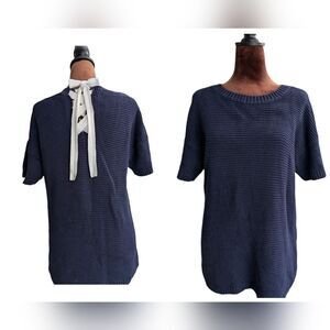 💯 cotton navy knit top with tie bow at the back